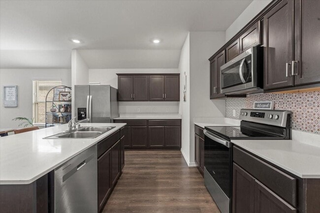 Building Photo - Modern single-story home with 4 bedrooms, 2 bathrooms, open-concept living, stylish kitchen, two-...