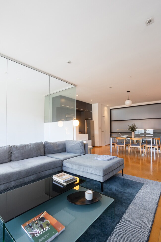 Abundant light with floor to ceiling windows and glass walls. - 2250 11th St NW