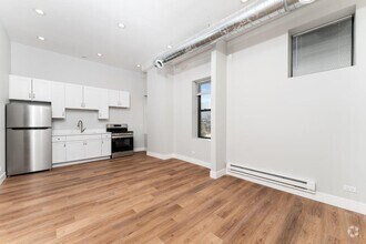 Building Photo - 1219 W Devon Ave