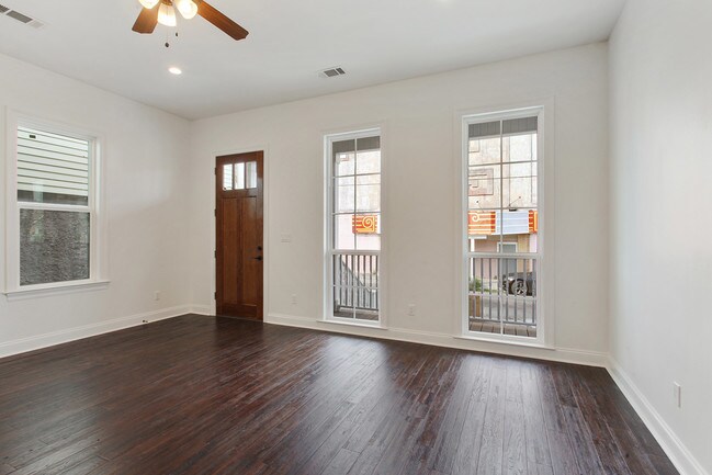 lots of light from full height windows - 8426 Apple St