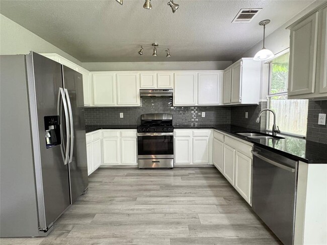 Building Photo - 2103 Aster Way