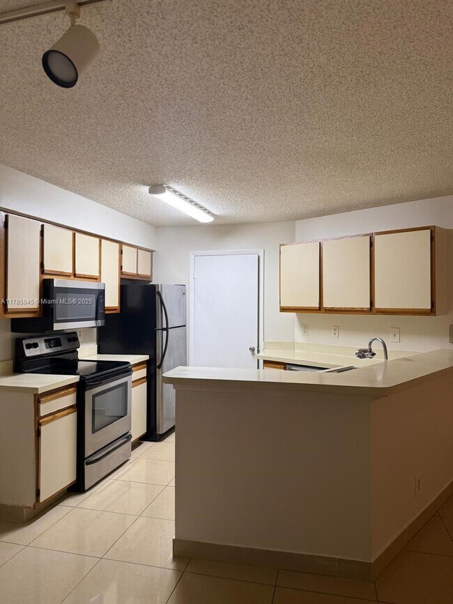 Foto del edificio - 9999 Summerbreeze Dr