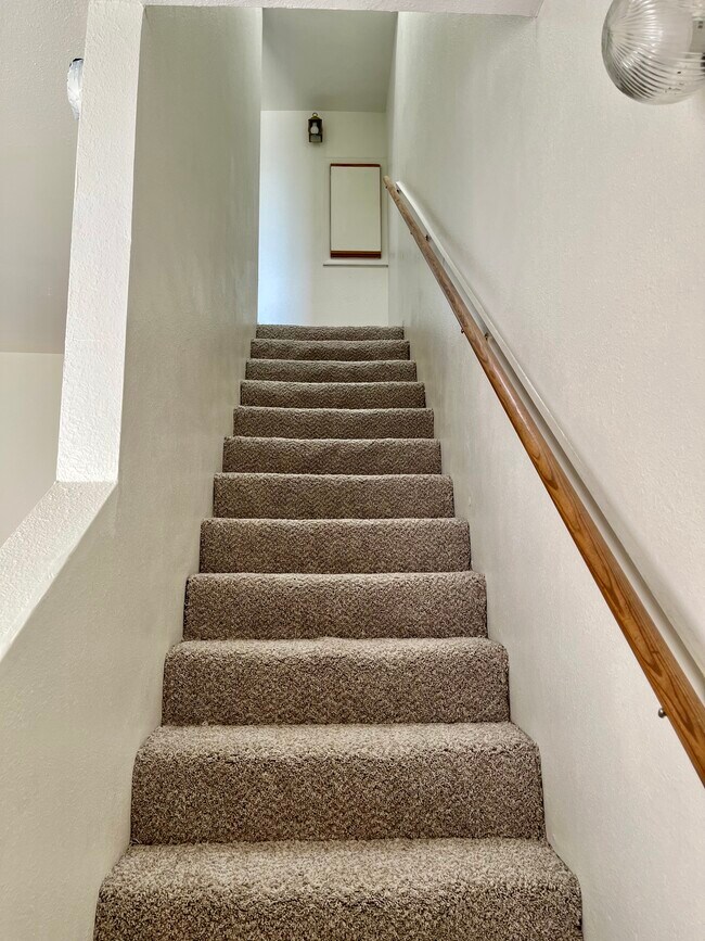 Stairs to second level - 3409 N Fontana Ave
