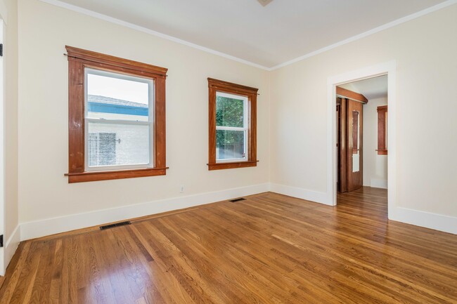 Primary bedroom with office and walk in closet. - 431 Athol Ave