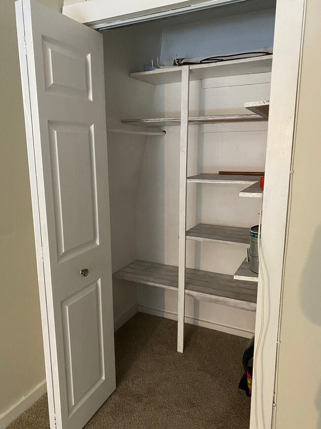 living room closet - 7628 Currier Rd