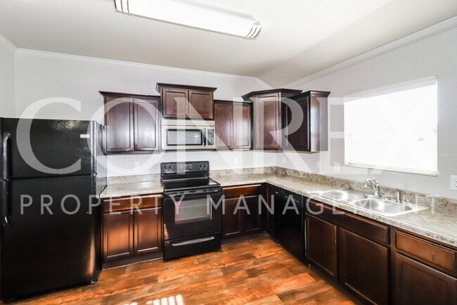 Foto del edificio - 12824 Bell Flower Drive