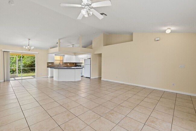 Building Photo - SPACIOUS FOUR BEDROOM!  Lehigh Acres