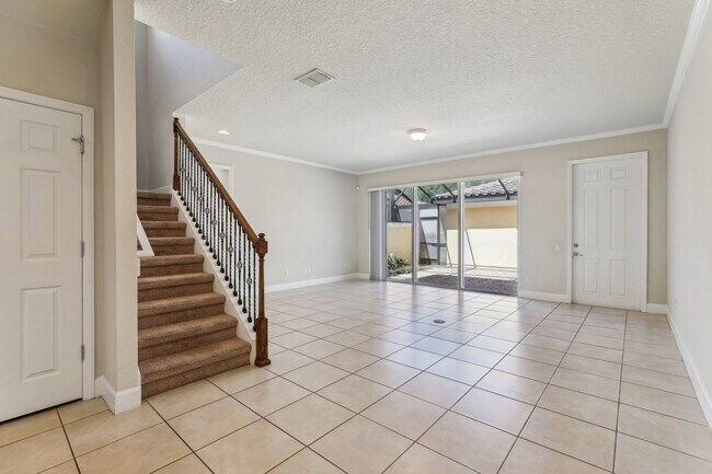 Building Photo - Gorgeous 3/3 Townhouse in VillageWalk of Lake Nona (Gated)