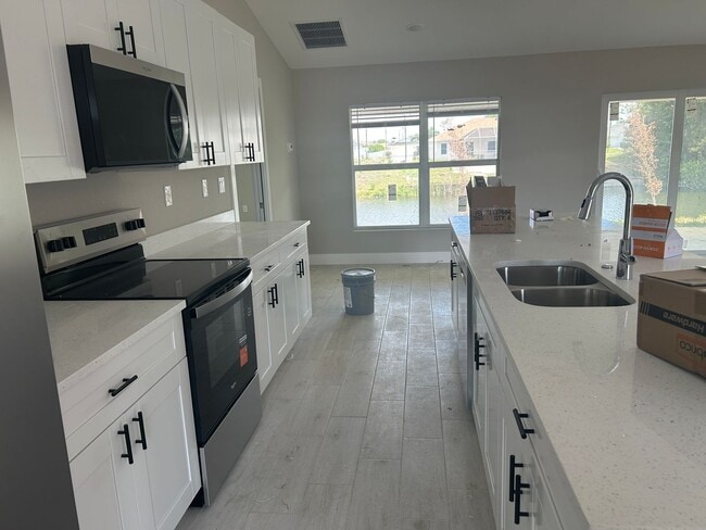 Building Photo - Coming soon  4/3  new construction overlooking canal
