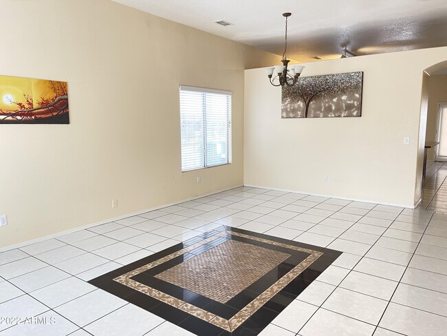 Building Photo - 6670 W Acapulco Ln