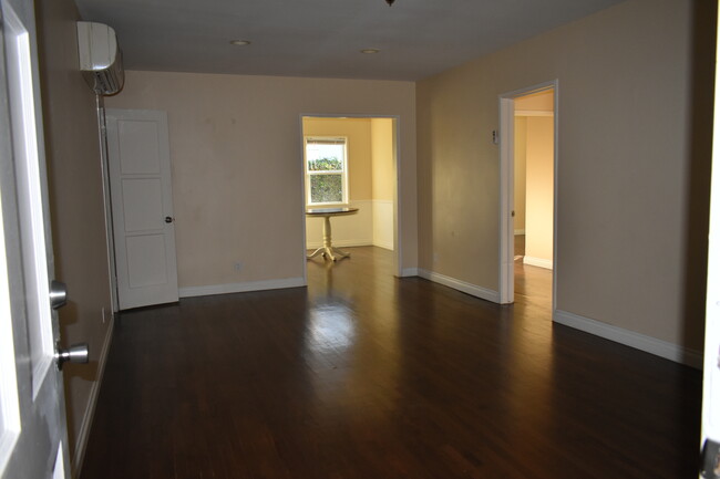 Living room going to the dining room & hallway - 1440 S Sherbourne Dr