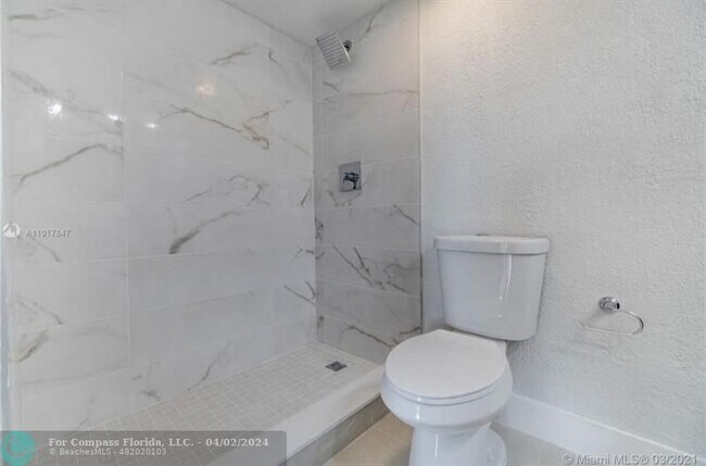 Building Photo - 4265 NW S Tamiami Canal Dr