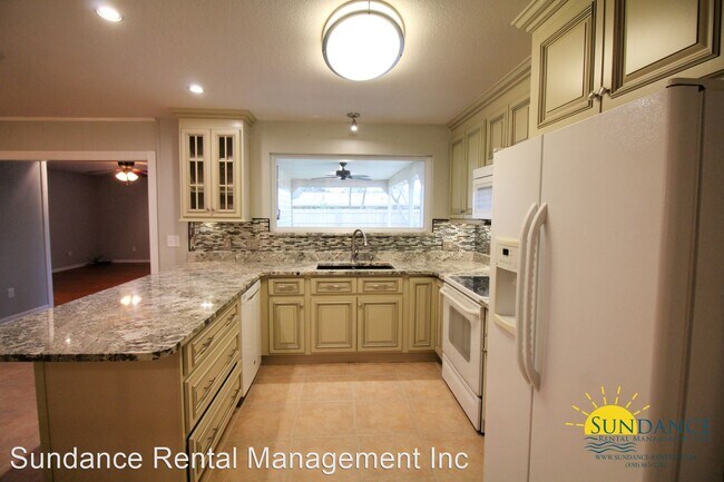 Building Photo - 3 br, 2 bath House - 1805 Rattan Palm Drive