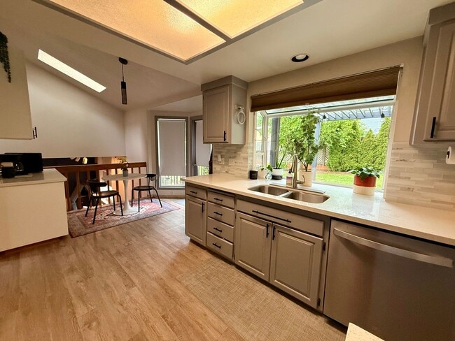 Building Photo - Charming 3 Bedroom Split-Level Home with Multiple Living Rooms & Spacious Back Yard