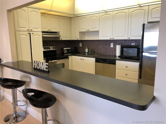 Building Photo - 19370 Collins Ave