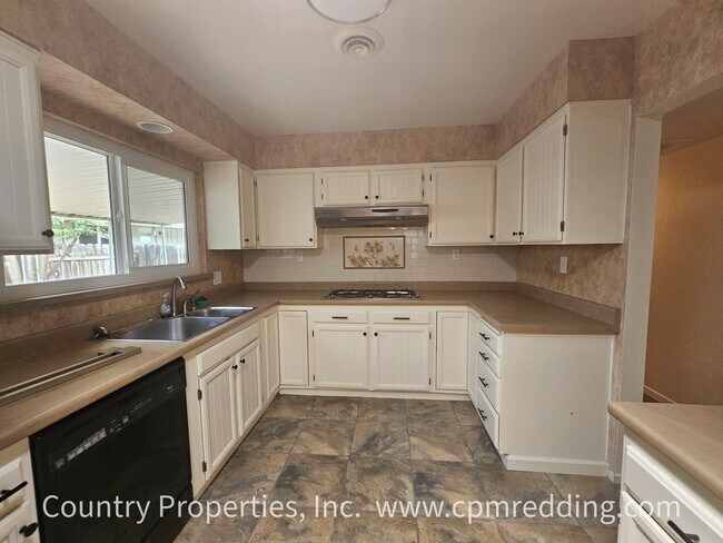 Building Photo - 4-Bedroom in the Garden Tract with Shop & ...