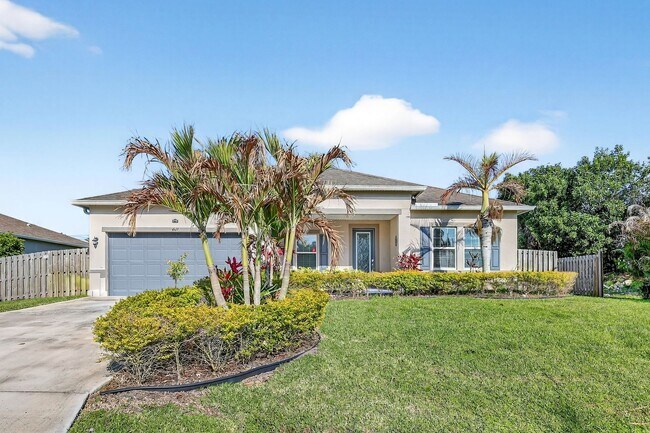 Photo - Modern 4-Bedroom Rental with Screened Patio & 2-Car Garage House