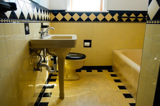 Black and Yellow Deco Bathroom - 655 S Dunsmuir Ave