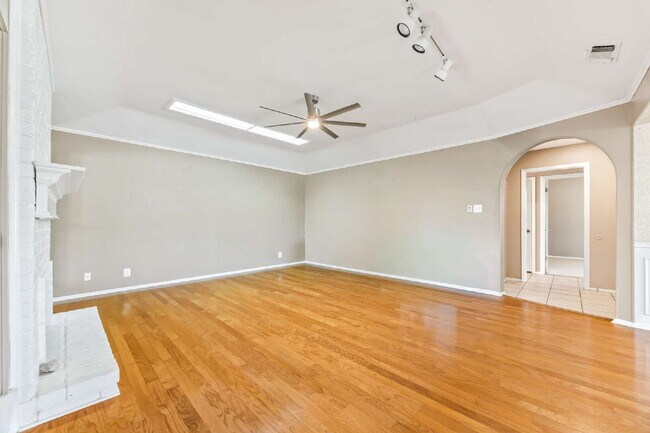 Building Photo - "Charming garden home offers 3-Bedroom Sanctuary with Cozy Fireplace in San Antonio – 1710 Sq Ft ...