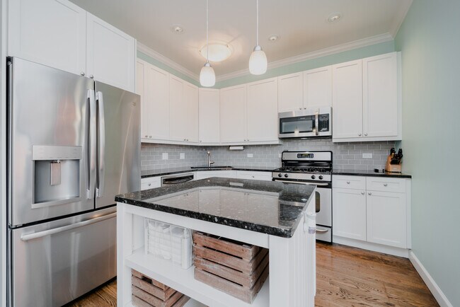 Building Photo - 1671 N Claremont Ave