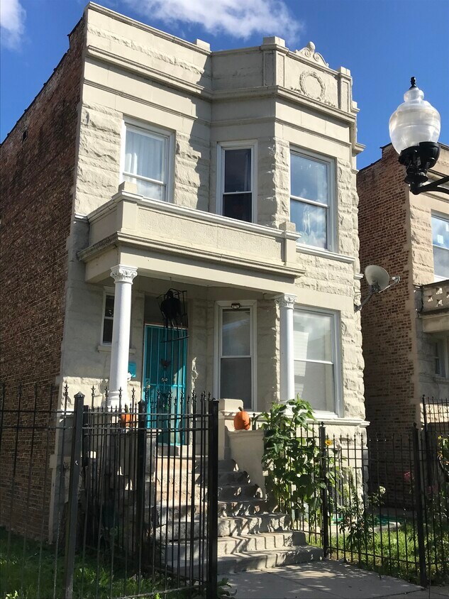Gray-stone building - 1631 S Central Park Ave