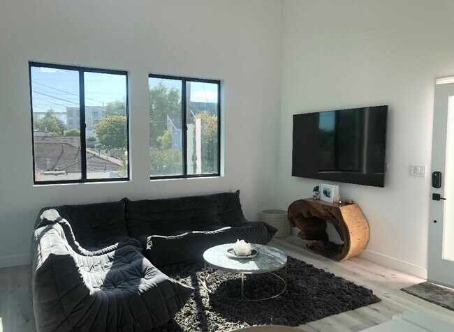 Huge flat screen tv in living room - 6952 W 77th St