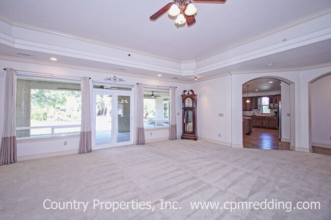 Building Photo - Gated Custom Home on Acreage with Solar an...