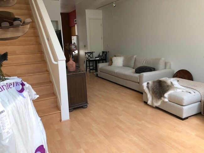 Family room-furniture just for showing - 44 Iron Horse Ln Townhome