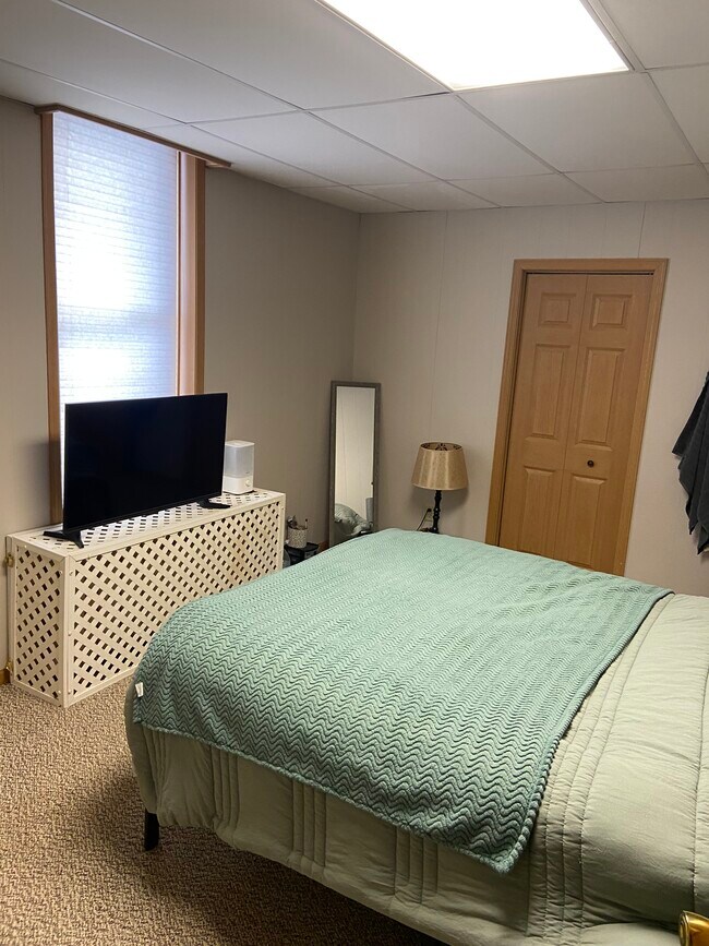 Bedroom with large walk in closet - 201 W Main St