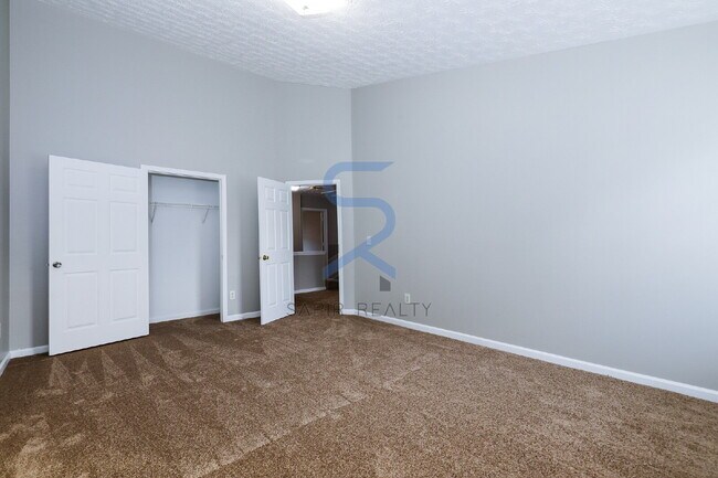 Photo - Move in before December 31st and choose your reward: a $250 Amazon Gift Card or a 55 Smart TV! Apartment