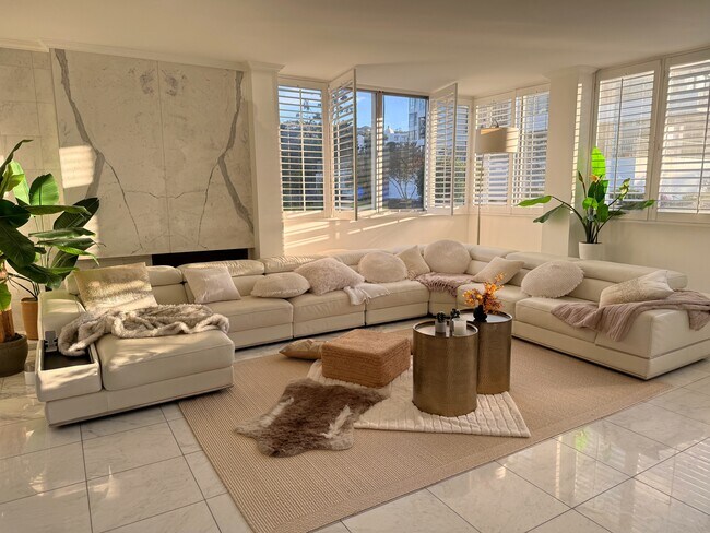 Luxurious leather sectional in sunlit living room - 17368 W Sunset Blvd