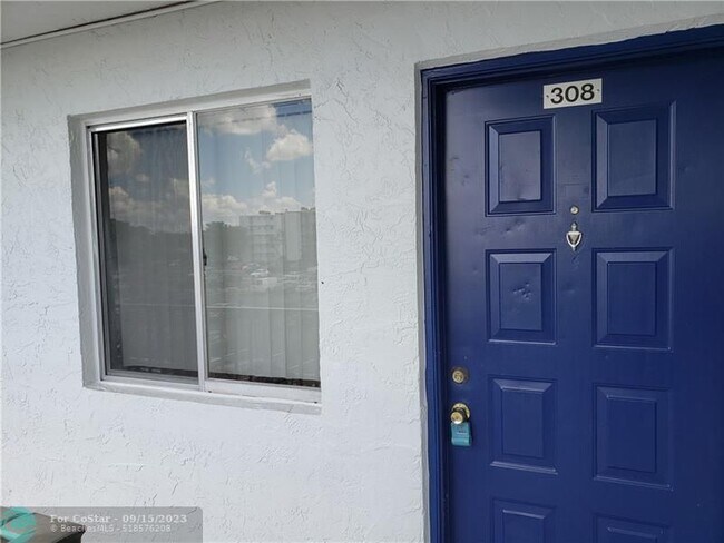 Building Photo - 8550 N Sherman Cir