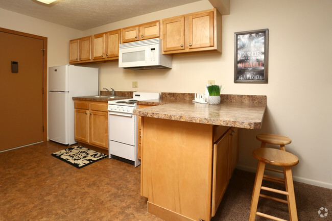 Studio kitchen - Kent Village Apartments