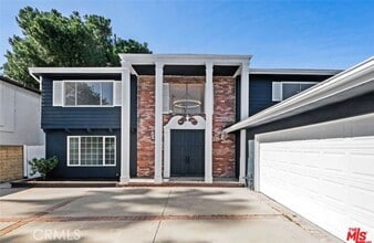 Building Photo - 6257 Lindley Ave