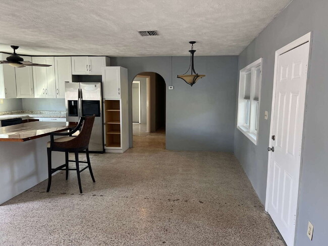 Building Photo - Charming 2-Bed Waterfront Retreat with Ter...