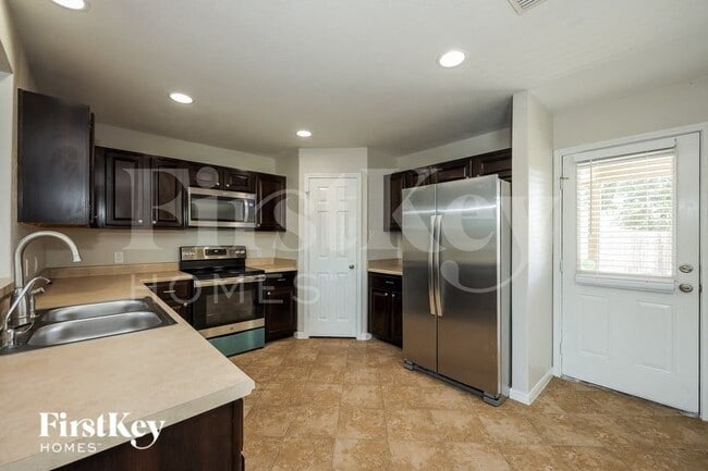 Building Photo - 10711 Ranchland Fox