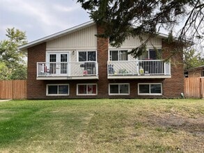 Building Photo - 5911-5955 55 Ave