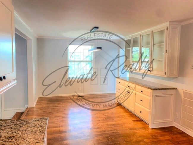 Building Photo - Stylishly Renovated Four Bedroom Home in H...