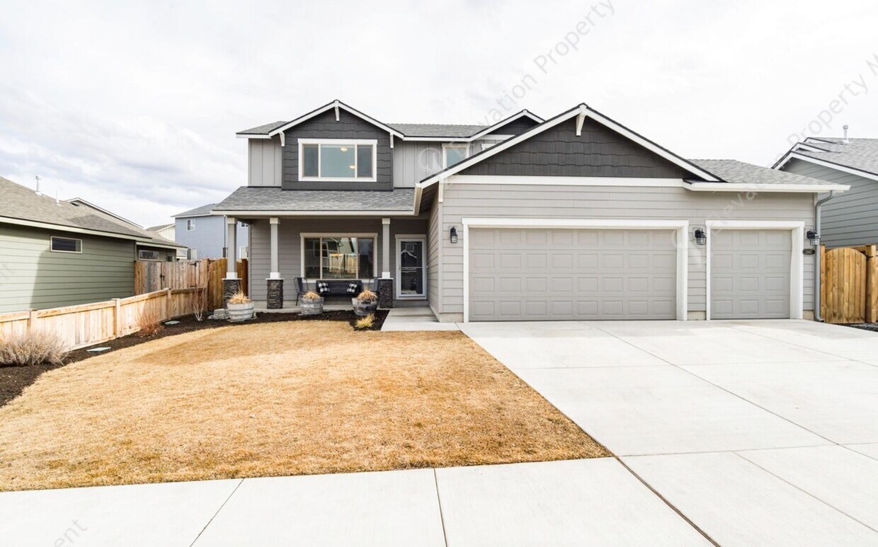 Primary Photo - Spacious 4-Bedroom Home with Main Floor Pr...