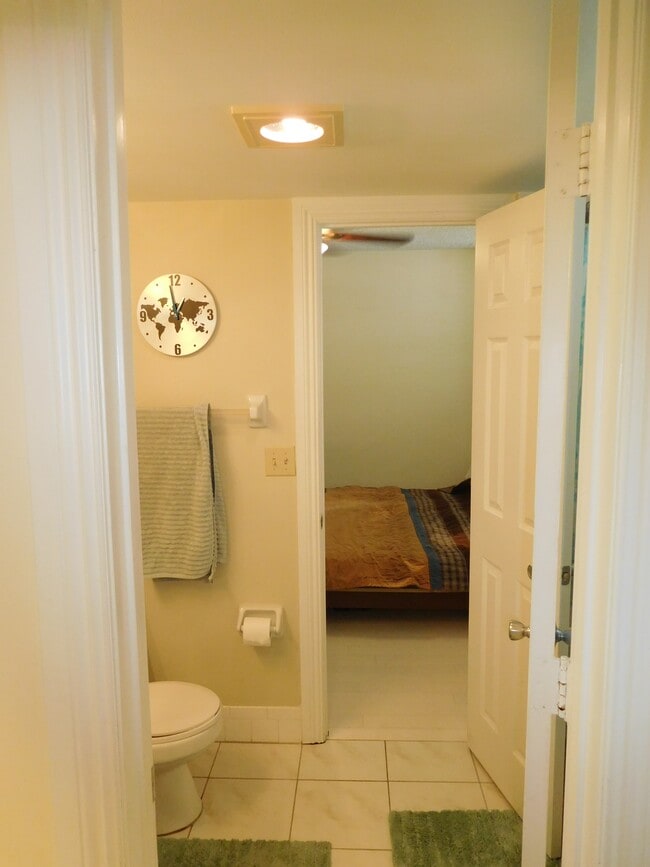 Front Bathroom leading onto bedroom - 9510 Seagrape Drive