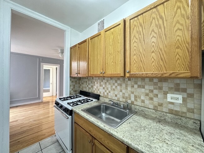 Building Photo - 1367 W Estes Ave