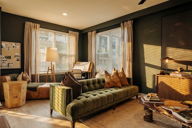 Espacio habitable de concepto abierto en los apartamentos Asher. - Asher