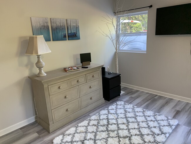 Large dresser with closet. Queen bed - 70 W Highland Rd