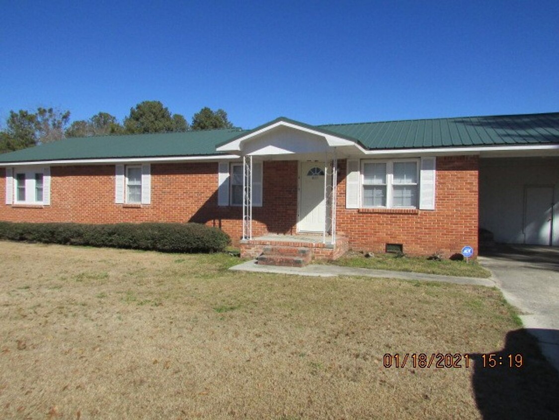 Primary Photo - 4 Bedroom and 2 bathroom Brick Home