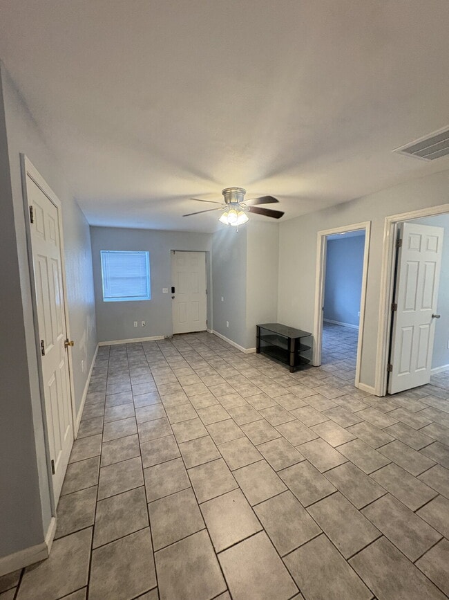 Building Photo - Open floor plan, four-bedroom two-bathroom with washer and dryer