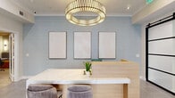 Located at 320 Jackson Hill St in Houston's vibrant 77007 corridor, this single-floor amenity space offers a sophisticated and functional environment designed to support productivity and community. The entrance greets visitors with a striking marble-topped reception desk anchored beneath a large sculptural drum chandelier, set against soft blue-toned walls adorned with a curated trio of framed artwork. Large black-framed glass doors and tile flooring with a geometric inlay pattern create a polished first impression.

The co-working lounge features light hardwood flooring, built-in shelving, and a series of illuminated individual workstations beneath pendant globe lighting. Comfortable navy wingback chairs and a round cocktail table invite casual collaboration, while a semi-private booth with marble-topped tables and richly textured wallcovering offers a more intimate setting.

A dedicated conference room accommodates small group meetings around a warm wood table with upholstered seating, a wall-mounted display screen, and a sculptural gold chandelier overhead. Natural light filters through slatted blinds, with views of surrounding greenery.

Private work nooks, finished with marble-surface desks and distinctive textured wallcoverings, offer quiet focus areas. Throughout, the design balances warm and cool tones with curated art and refined finishes, creating a welcoming and professional atmosphere.