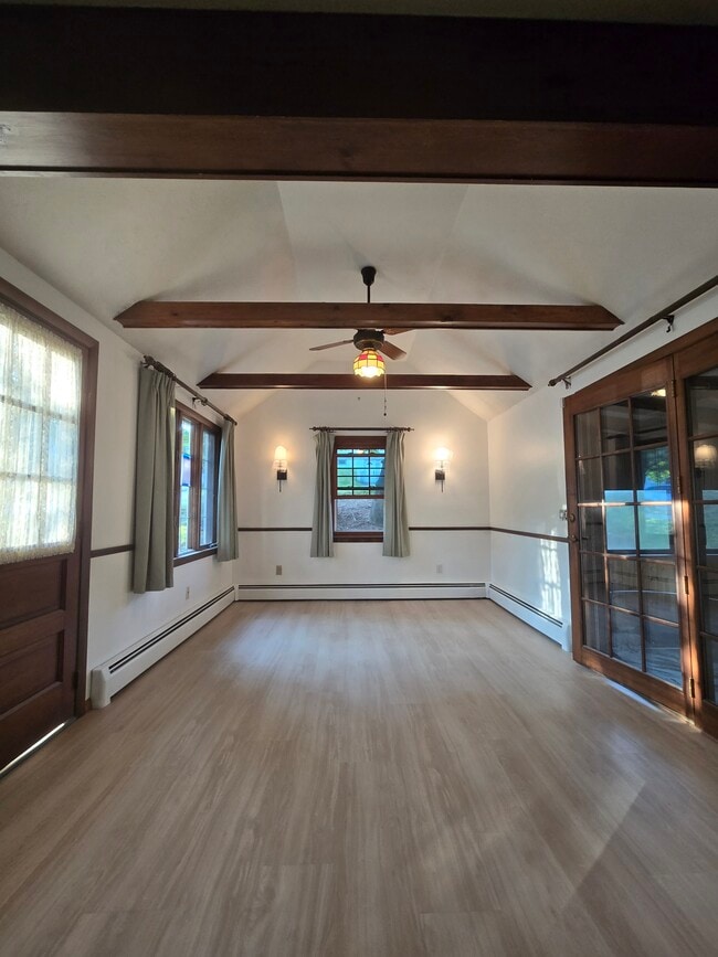Vaulted dining room with screened in porch - 1280 S Beech St