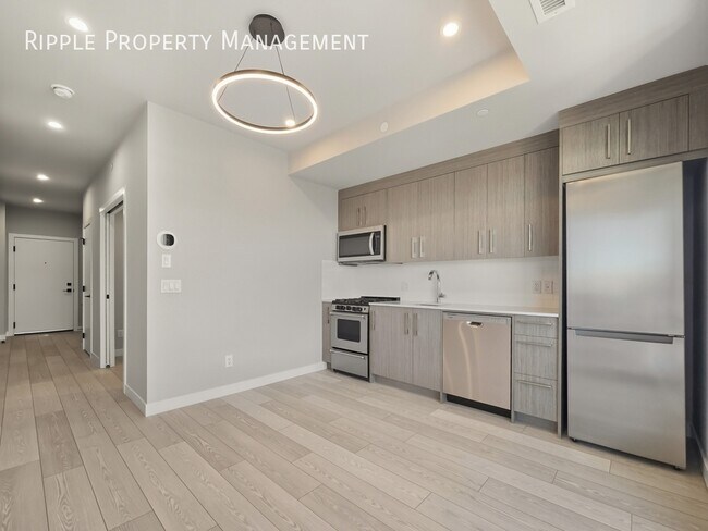 Photo du bâtiment - 110-18A 18a St NW