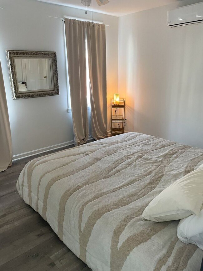 Large main bedroom with king Nectar memory foam mattress and blackout curtains - 2955 Chatham St
