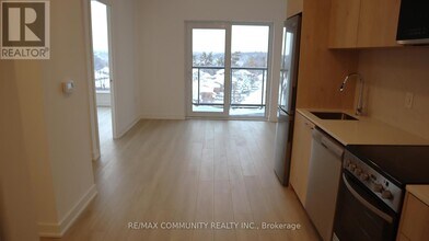 Building Photo - 7437 Kingston Rd